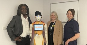 Staff from Scarborough Hospital with DAISY the robot.