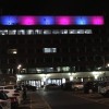 York Hospital main entrance with its external lights turned pink and blue.