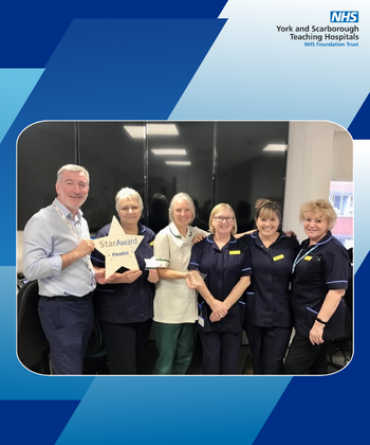 Star Award winners Deborah Hawkshaw and Nicola Slade receiving their award from Andrew Bertram, Finance Director, and three colleagues