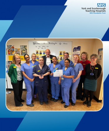 Group image of Bridlington Eye Clinic team with Chief Executive Simon Morritt. One team member is holding their Star Award.