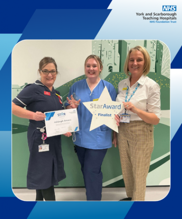 Star Award winner Ashleigh Bowers receiving her award from Dawn Parkes, Chief Nurse, and a colleague.