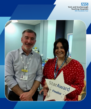 Star Award winner Georgia Miles receiving her award from Andrew Bertram, Finance Director and Deputy Chief Executive.