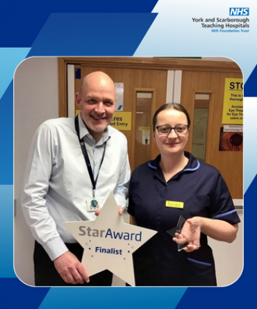 Star Award winner Sharon Bartle receiving her award from Simon Morritt, Chief Executive.