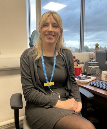 Liz Hill at her desk.