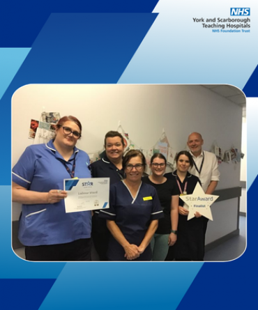 Staff from the Labour Ward receive their Star Award and certificate from Simon Morritt, Chief Executive