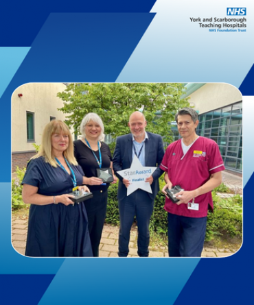 Star Award winners Dawn Lowery, Rebecca Smart, and Paul Sorat receiving their award from Simon Morritt, Chief Executive