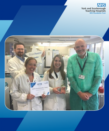 Star Award winners SHYPS Biochemistry Team receiving their award from Simon Morritt, Chief Executive