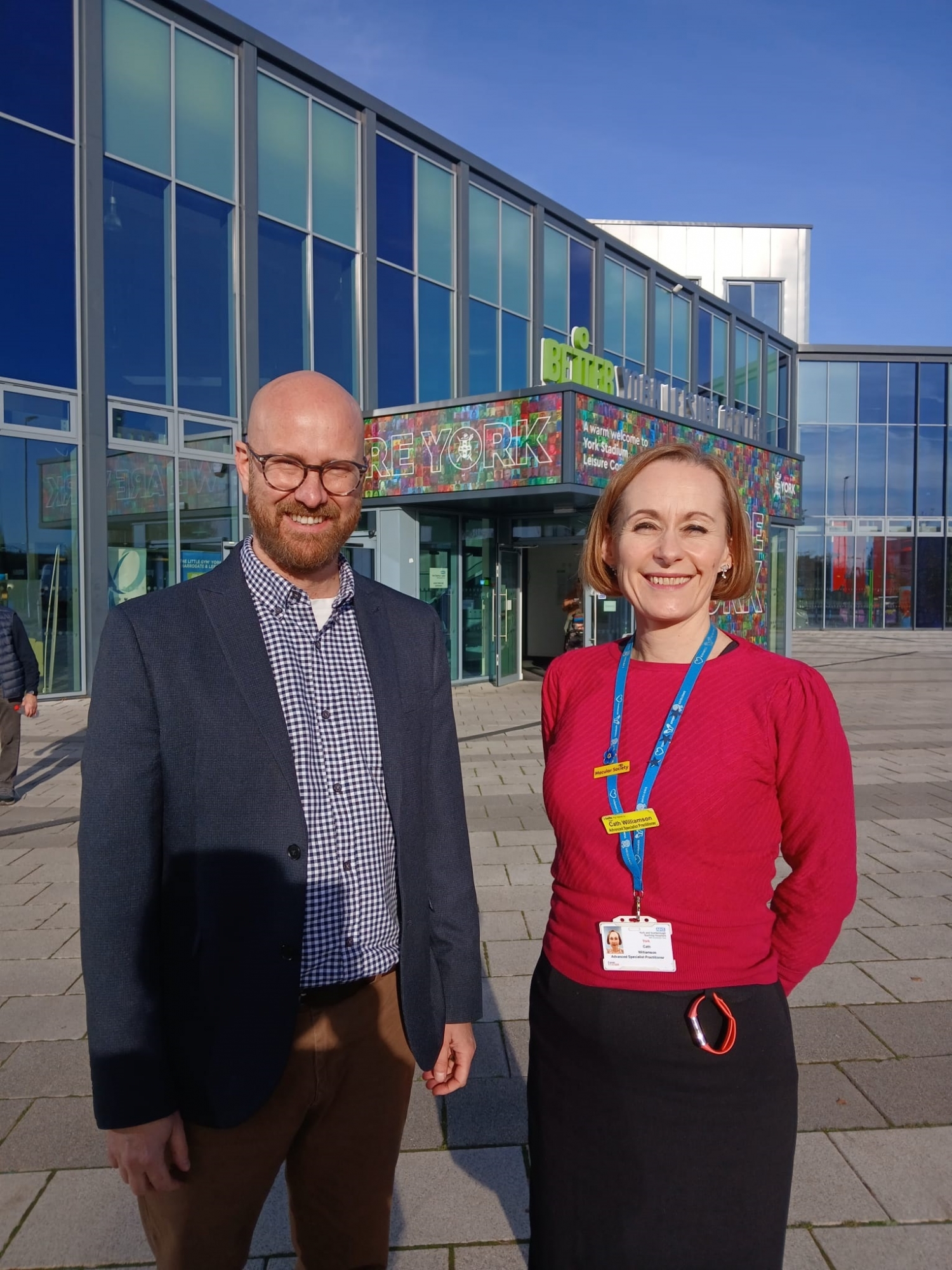 MySight York Chief Executive Scott Jobson with Advanced Specialist Practitioner Cath Williamson in front of the stadium.