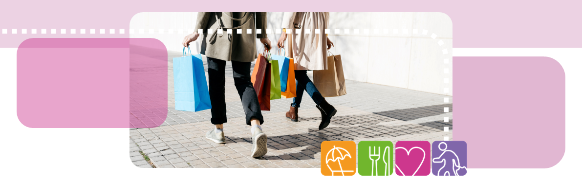 two people walking with shopping bags